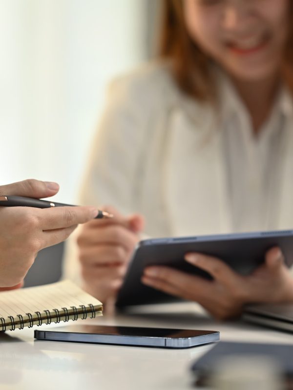 image-business-team-using-digital-tablet-analyzing-financial-data-stock-market-information-meeting